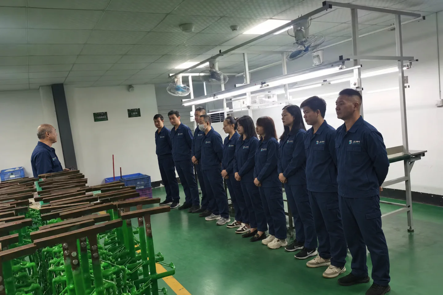 JLYPT production team in company uniforms