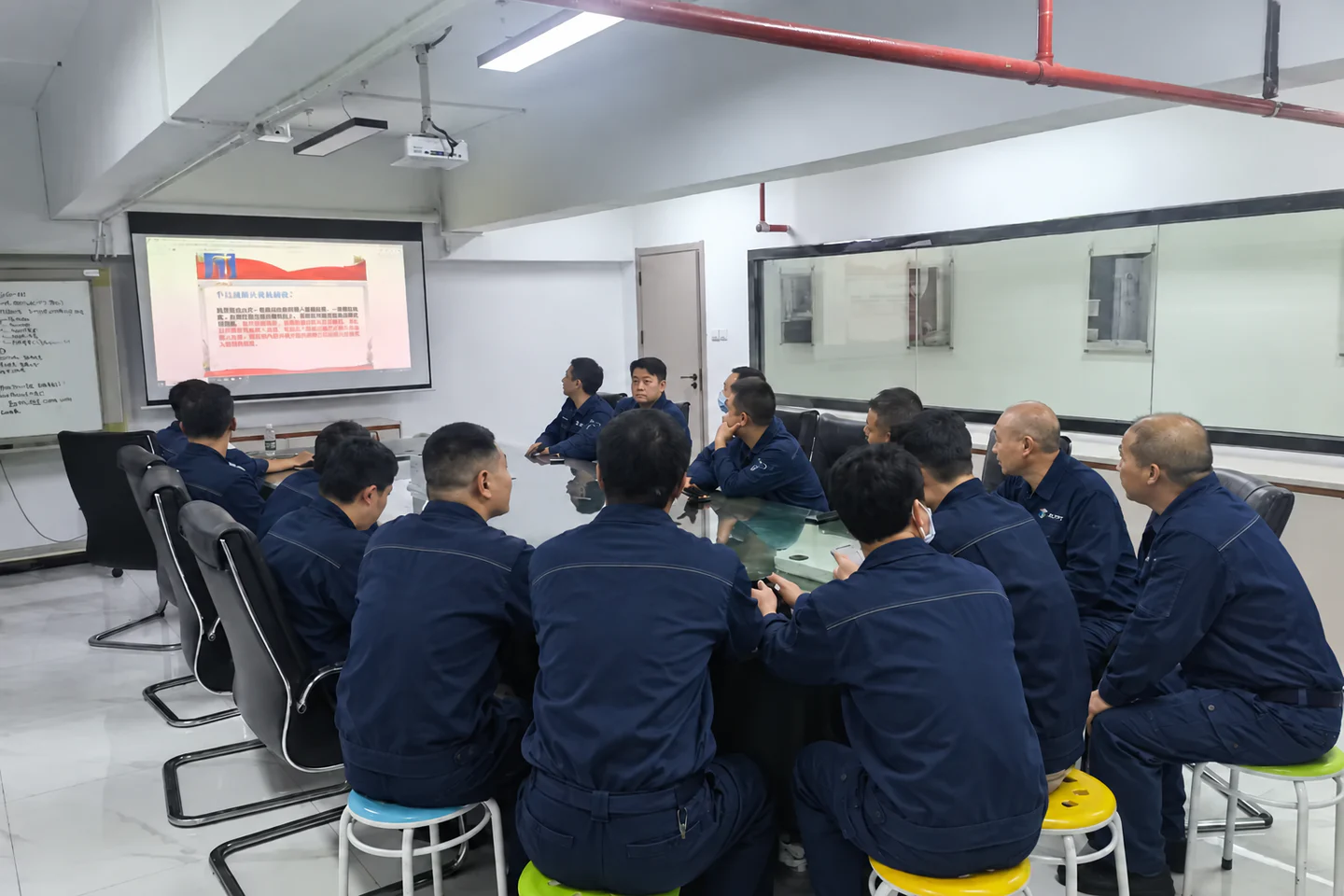 JLYPT engineering team discussing technical requirements